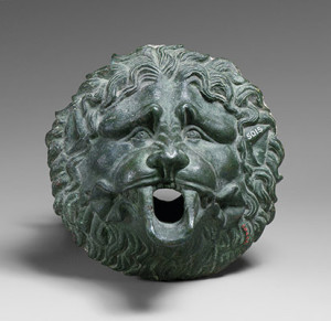 塞浦路斯的狮子面具形式的青铜水喷口。