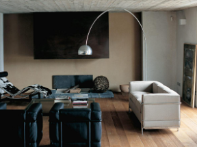 LC furniture- The Cassina LC2 armchair and LC4 chaise lounge in a living room.