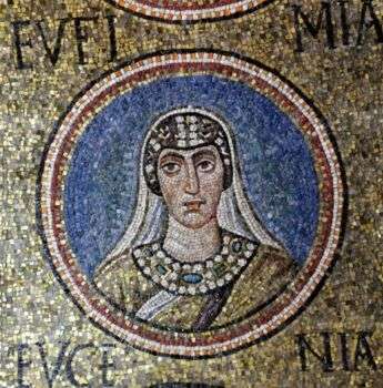 Photo of a mosaic in the Archiepiscopal Chapel. A veiled person's upper body is depicted within a circle. Vivid colors are utilized.